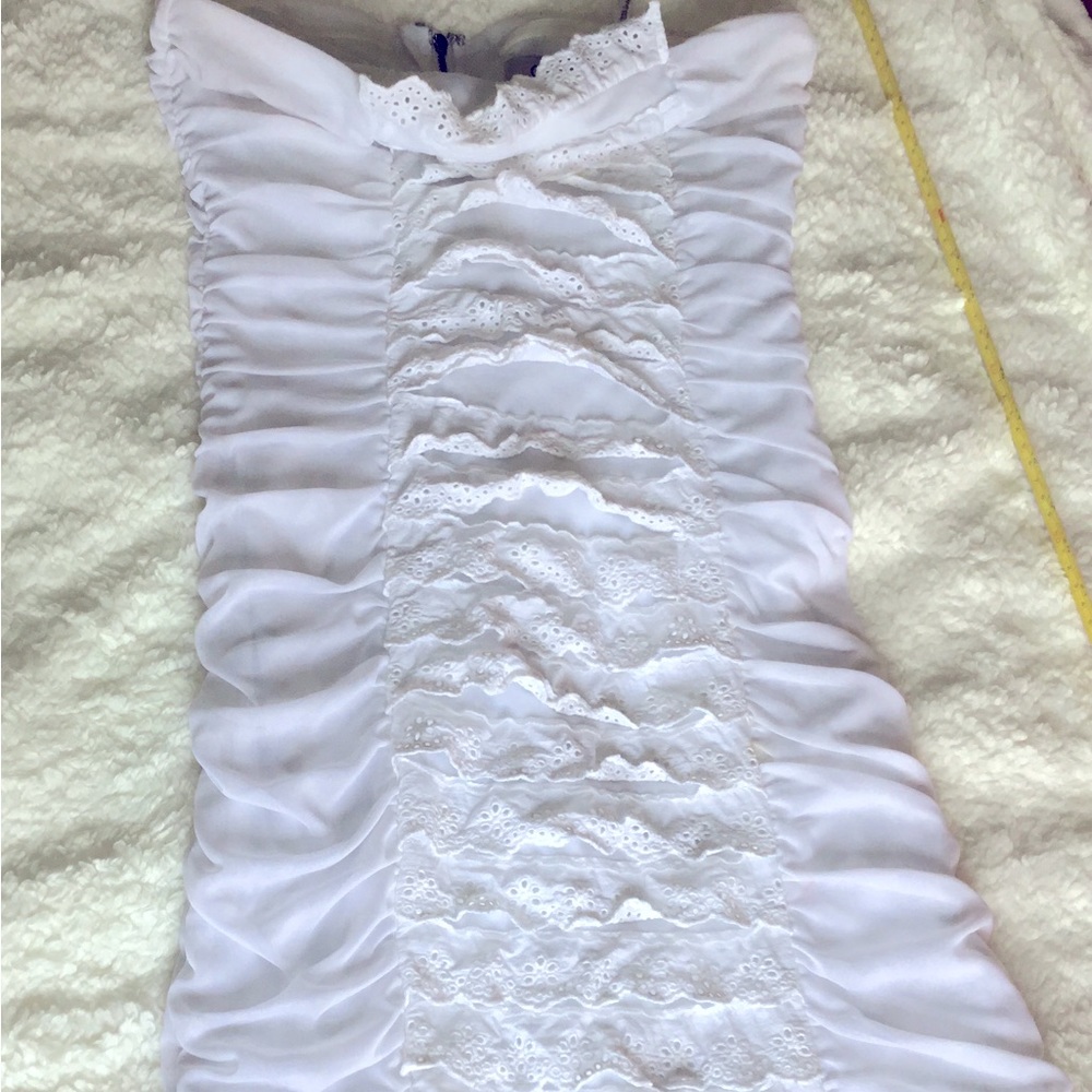 Strapless, eyelet lace, rouched, mini dress.